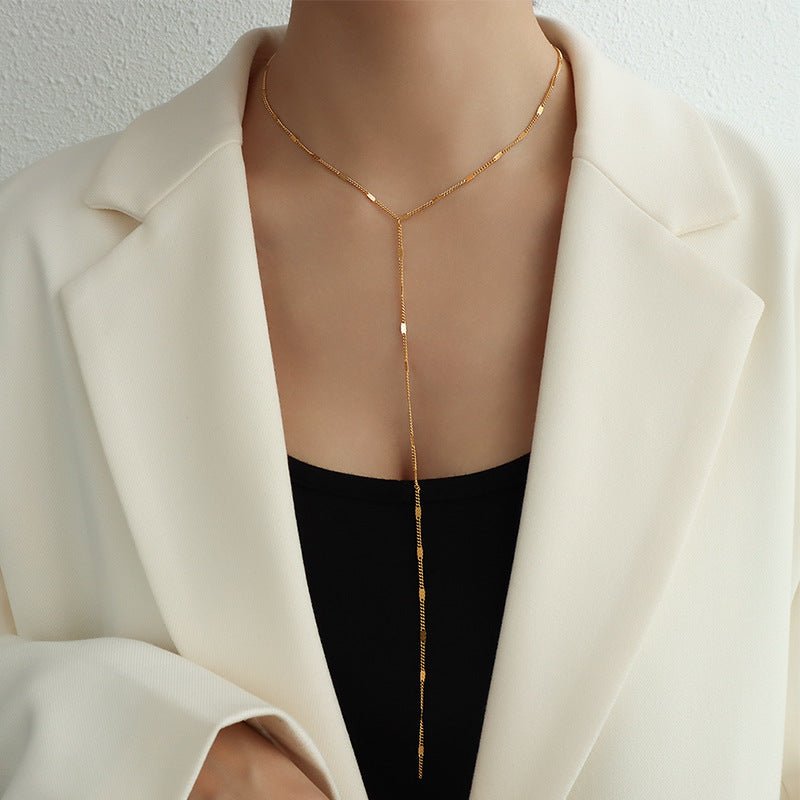 TasselMinimalistLariatNecklace Gold 1.jpg